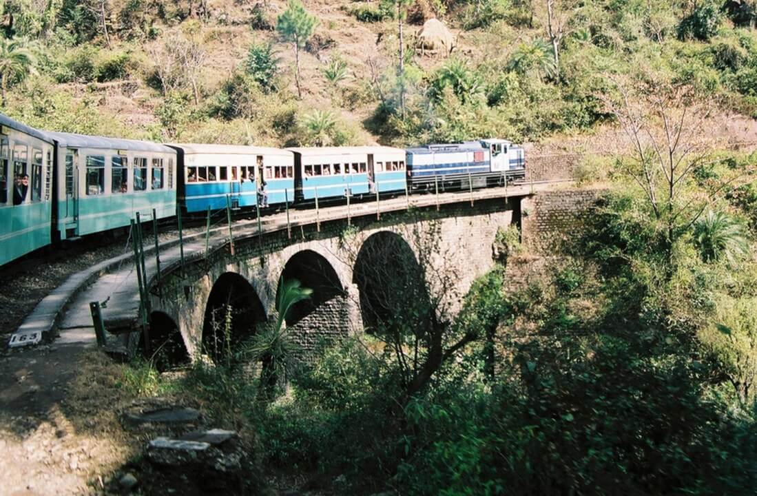 1099px-KSR_Train_on_a_small_bridge_05-02-12_52